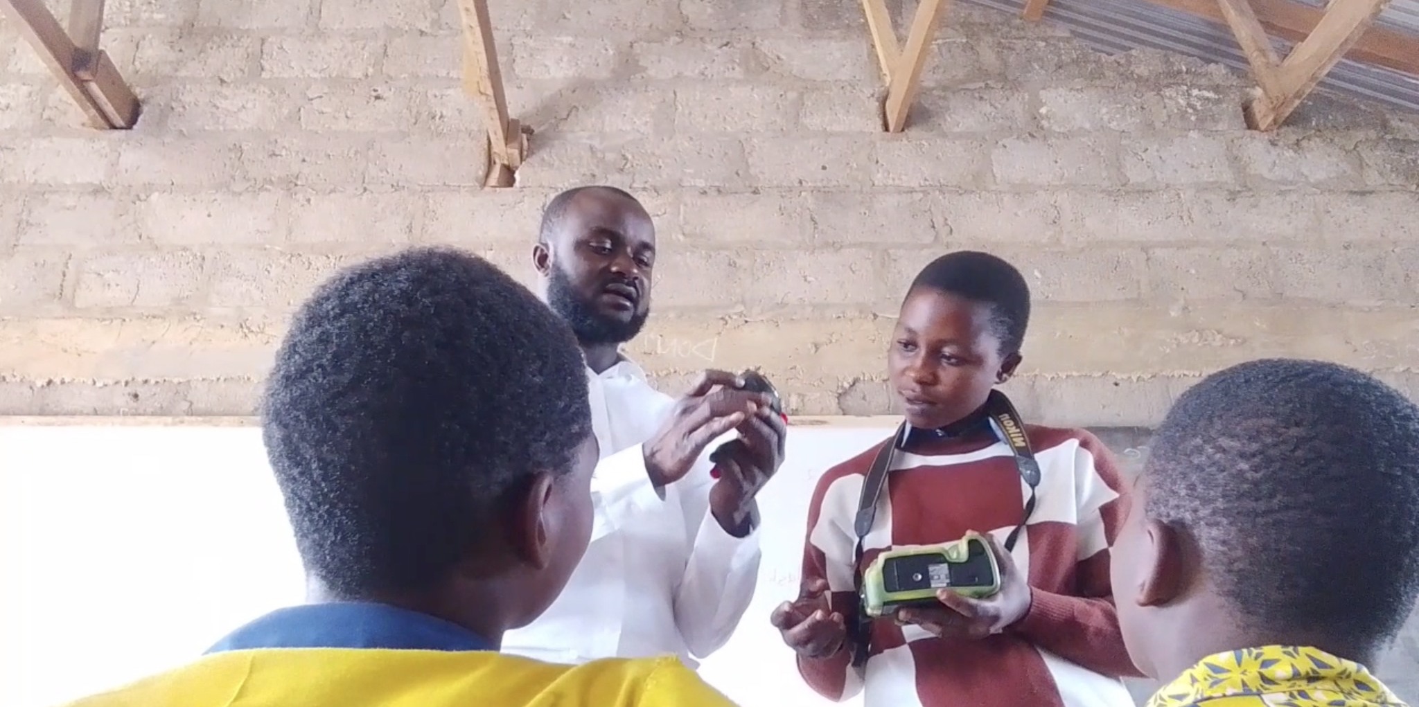 Students learning photography at Nechair